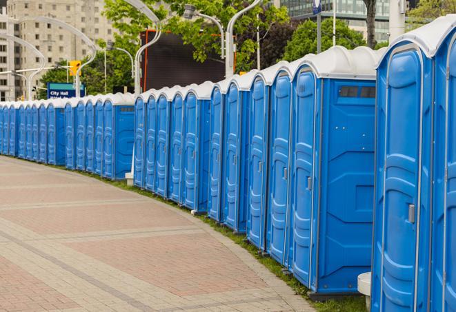 outdoor restroom setup for a special event, with sleek and modern portable restrooms in Blue Springs